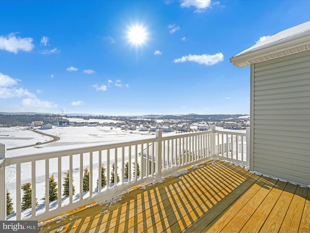 view of snow covered deck