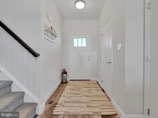 doorway to outside with light hardwood / wood-style floors