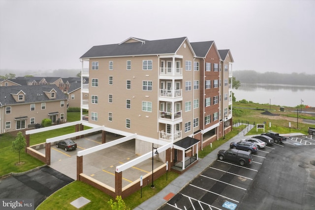 16131 River View Ct, Bristol, PA 19007 - view of apartment building / complex with uncovered parking and a water view