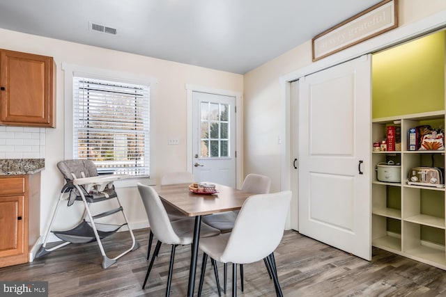 dining room featuring dark hardwood / wood-style floors