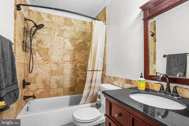 full bathroom featuring toilet, crown molding, shower / tub combo with curtain, tile walls, and vanity