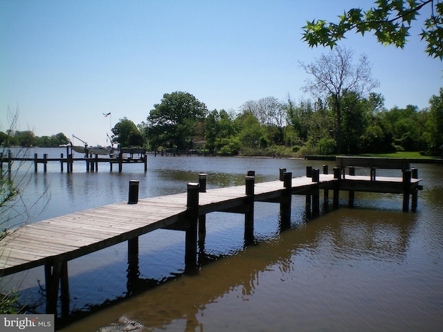 view of dock with a water view