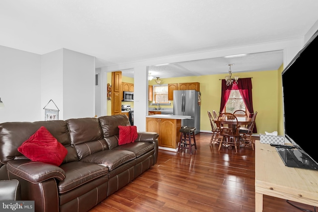 living room with dark hardwood / wood-style floors