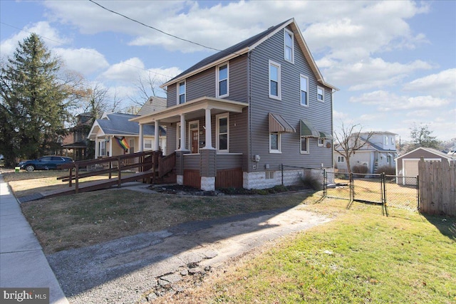 view of front facade with covered porch and a front yard