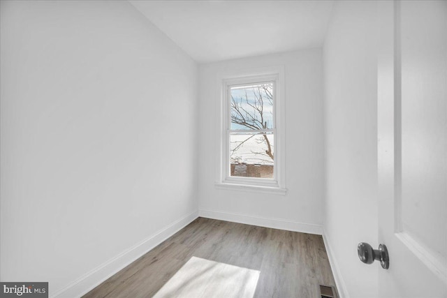 unfurnished room featuring light wood-type flooring