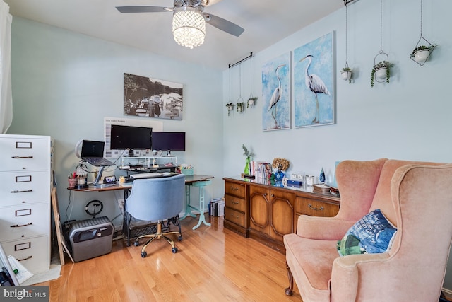 office area with ceiling fan and light wood-type flooring