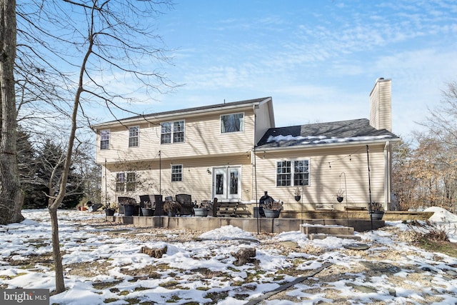 view of snow covered property