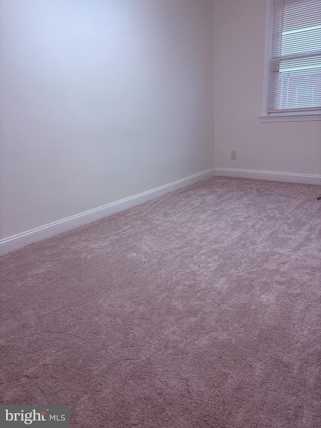 empty room with carpet floors