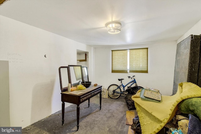 sitting room featuring carpet flooring