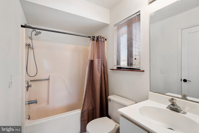 full bathroom featuring vanity, shower / bathtub combination with curtain, and toilet