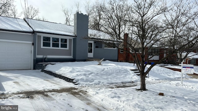 exterior space with a garage