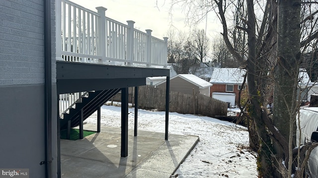 view of snow covered patio