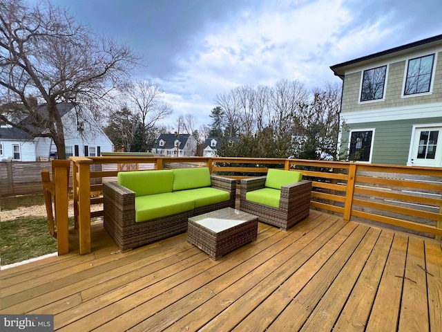 deck with an outdoor hangout area