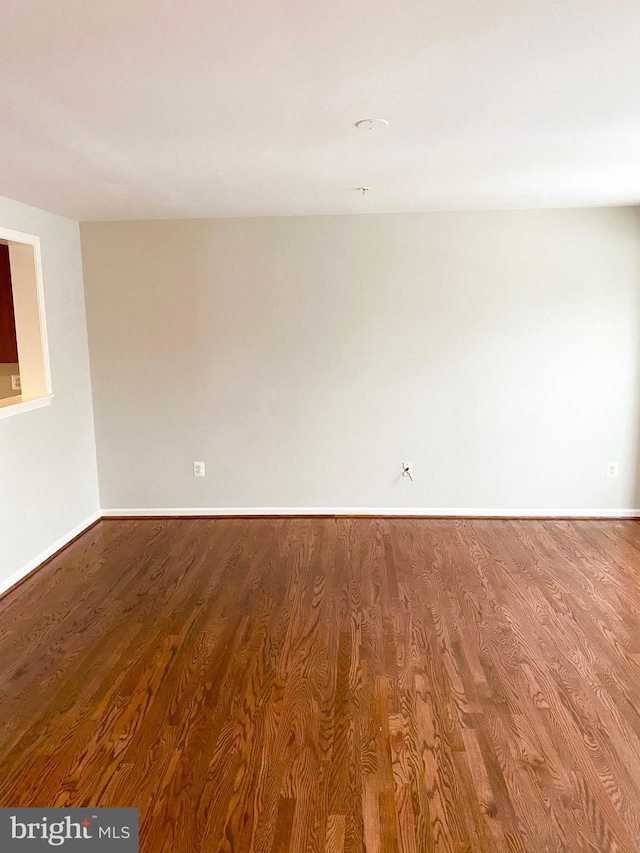 empty room featuring hardwood / wood-style floors