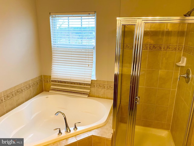 bathroom featuring plus walk in shower