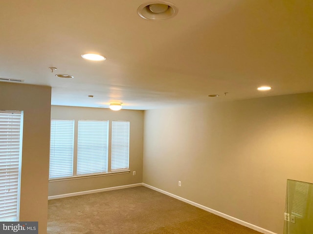 view of carpeted spare room