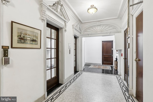 hallway featuring crown molding