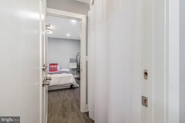 hallway featuring wood finished floors