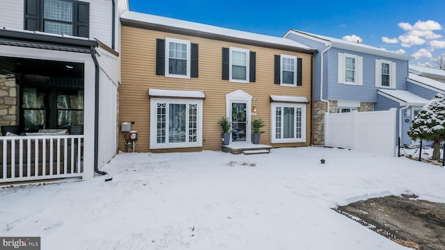 view of snow covered house