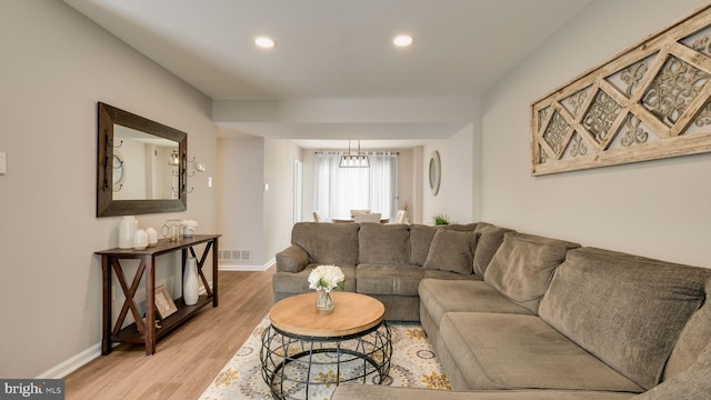 living room with hardwood / wood-style floors