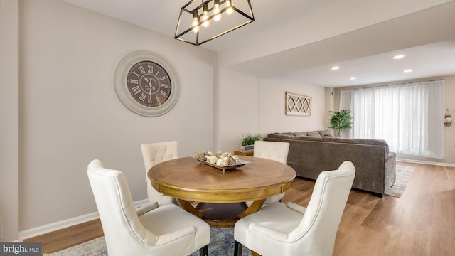 dining area featuring hardwood / wood-style flooring