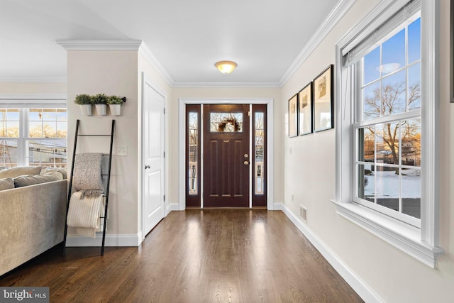 foyer featuring crown molding and dark wood-type flooring