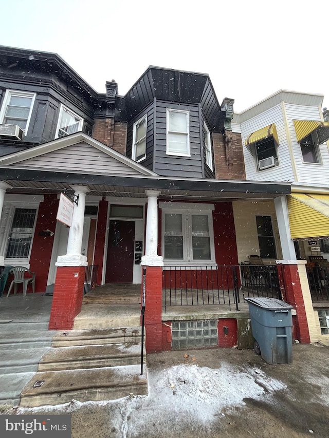 view of property featuring a porch