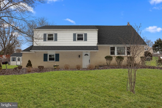 view of front of property with a front lawn