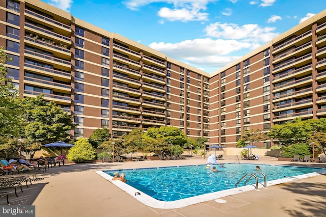 pool featuring a patio