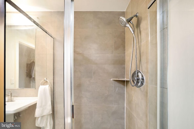 bathroom featuring an enclosed shower