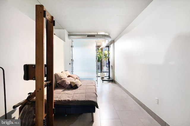 bedroom featuring floor to ceiling windows