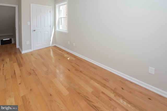 unfurnished bedroom with light hardwood / wood-style flooring