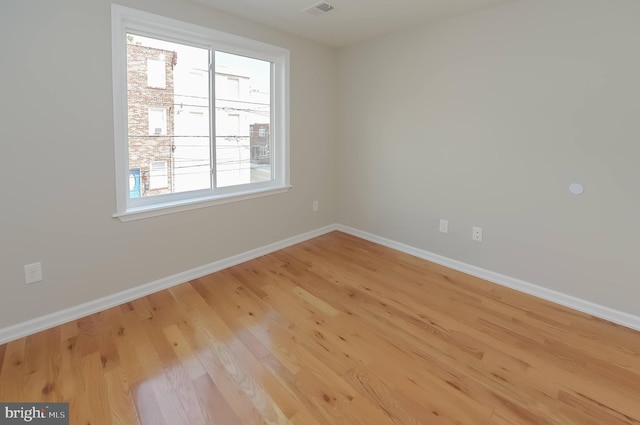 empty room featuring light hardwood / wood-style floors