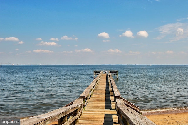 dock area featuring a water view