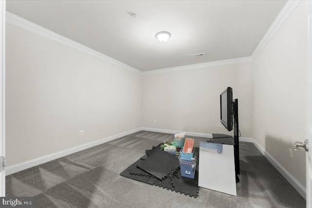 workout room with ornamental molding and carpet