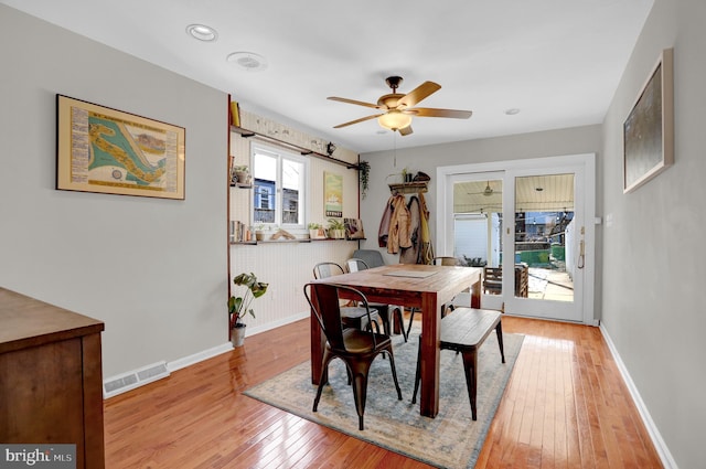 dining area with ceiling fan, plenty of natural light, and light wood-type flooring