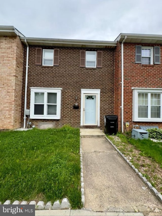 multi unit property featuring brick siding