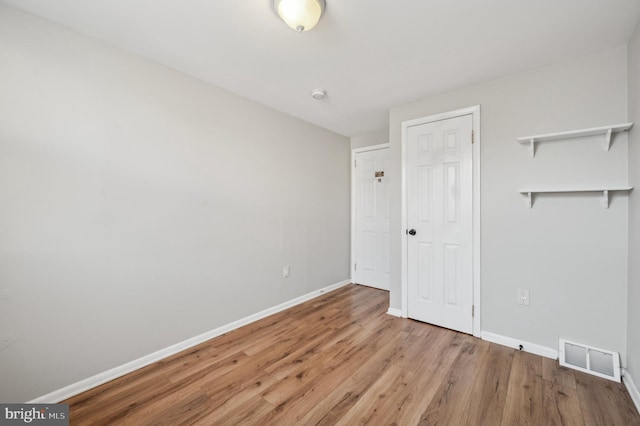 empty room featuring light hardwood / wood-style flooring