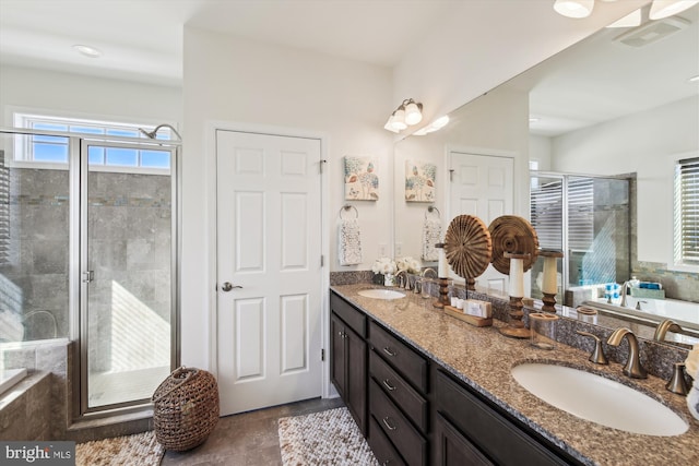 bathroom featuring vanity and plus walk in shower