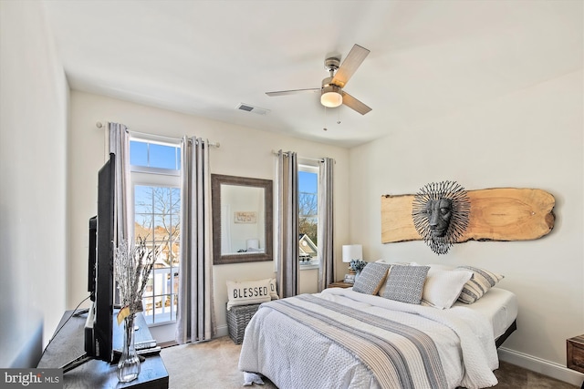 carpeted bedroom featuring ceiling fan