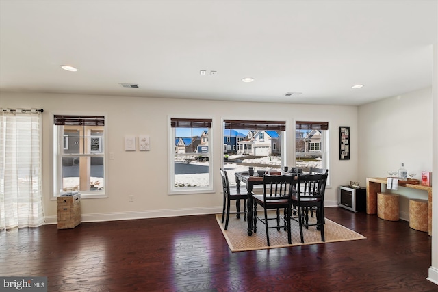 dining room featuring dark wood-type flooring