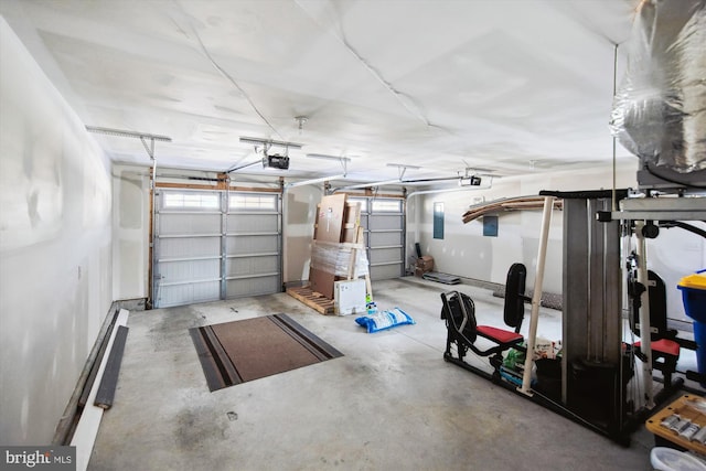 garage featuring a garage door opener