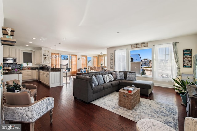 living room with dark wood-type flooring