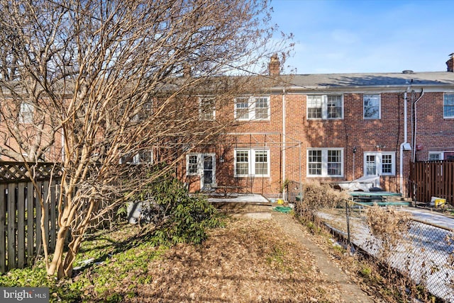 back of house featuring a patio area