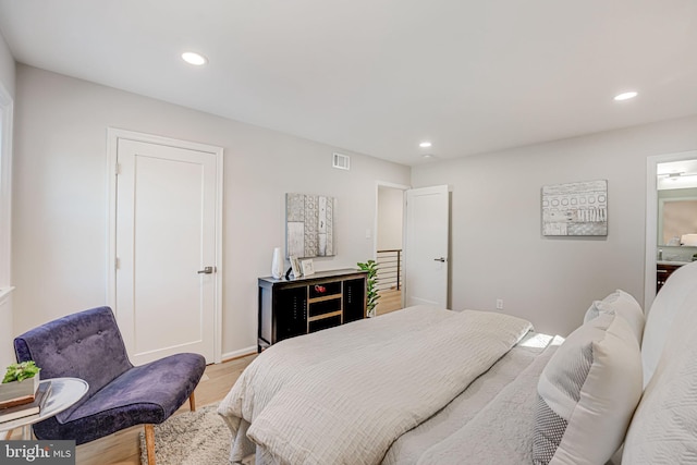 bedroom featuring light hardwood / wood-style flooring