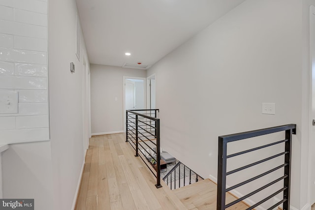 hall with light wood-type flooring