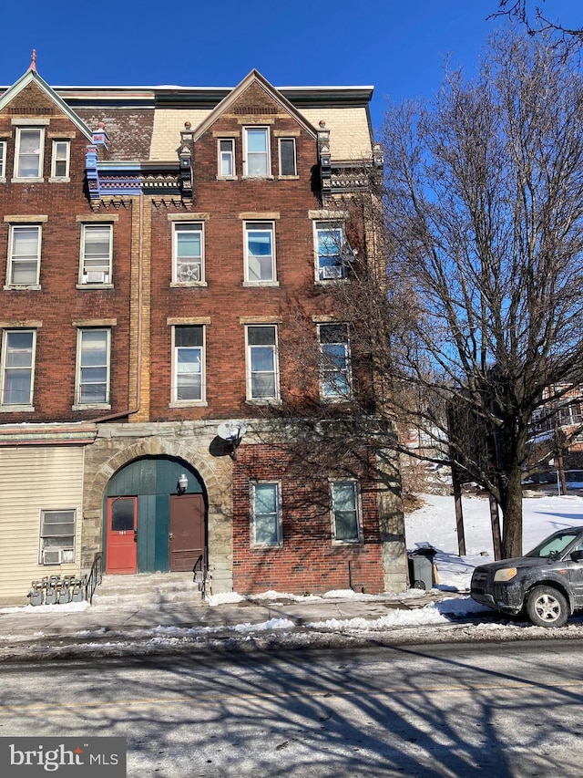 view of snow covered building