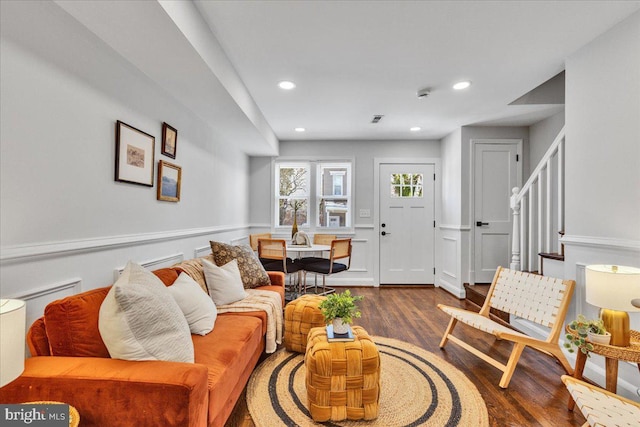 living room with dark hardwood / wood-style floors