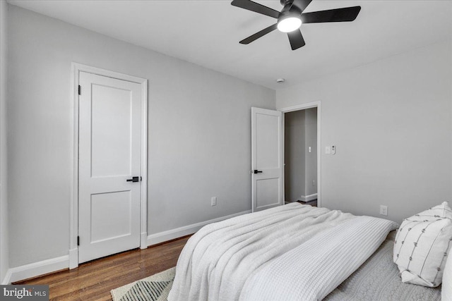 bedroom featuring hardwood / wood-style flooring and ceiling fan