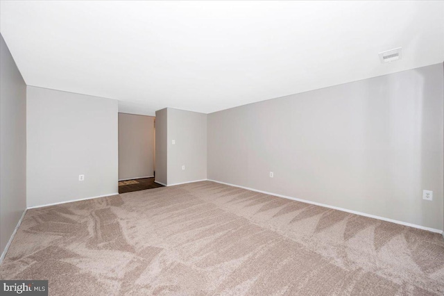 unfurnished room featuring carpet floors